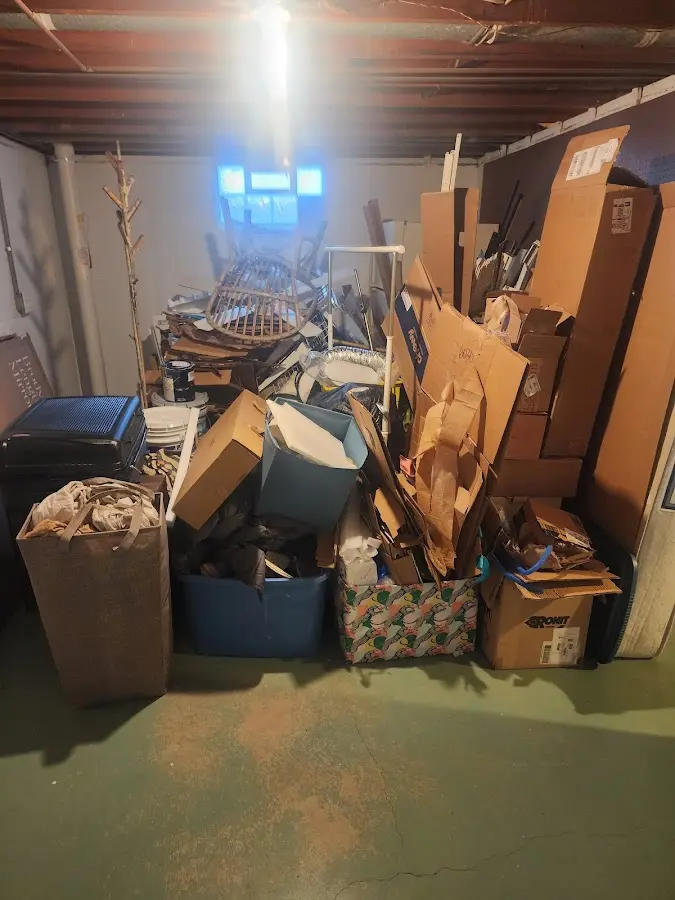 Roll-off dumpster container at job site for 2 Yard Dumpster Rental in Ashland